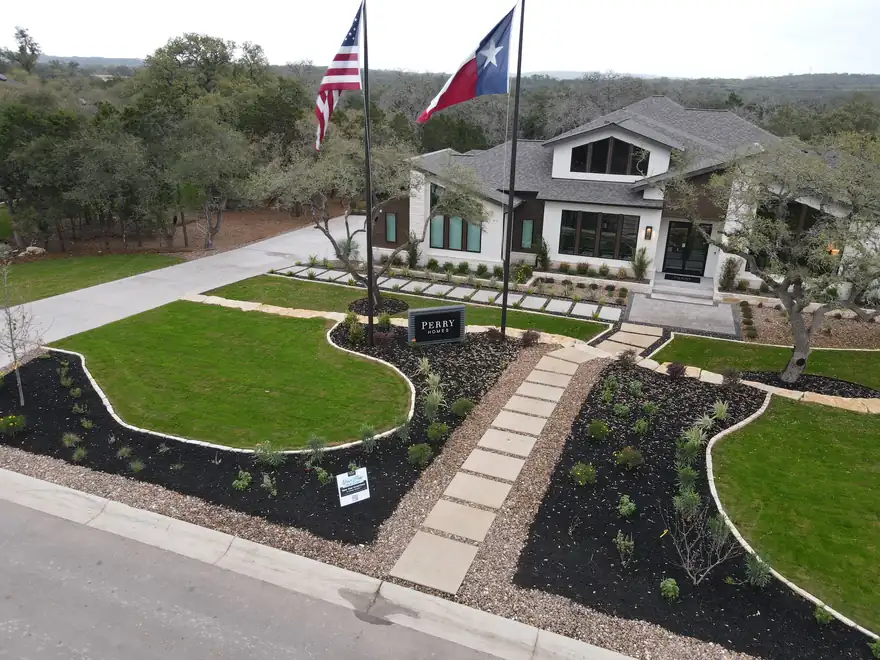 Aerial view of a Perry Homes model home landscape